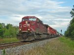 CP 9653 leads a westbound manifest departing the siding